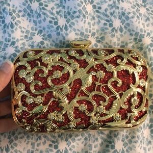 Red and gold metal clutch